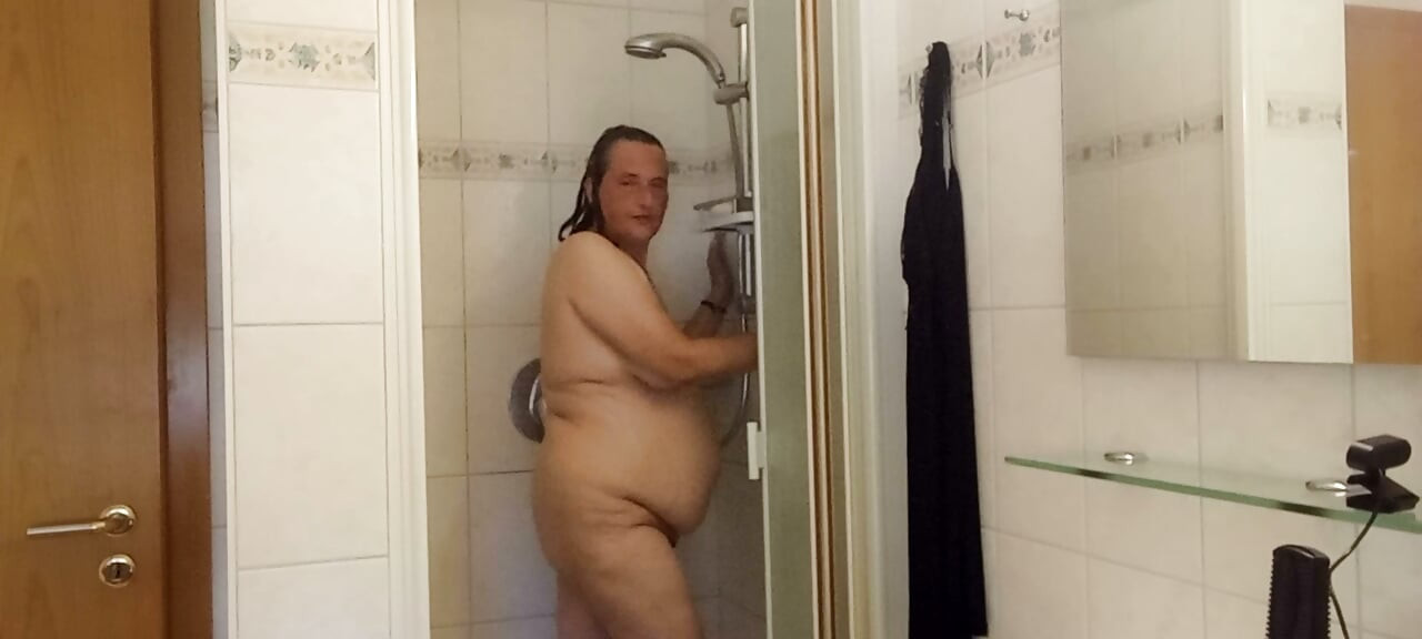 Chubby mature woman in the shower - soft belly - part 2