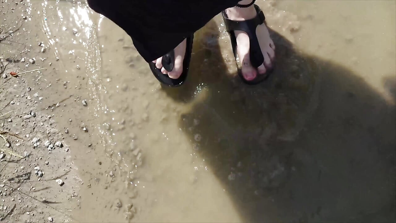 Outdoor in a Black Caftan and Barefoot in Black Birkenstocks