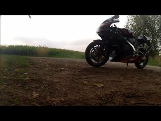 alobiker in a video with my aprilia in leathersuit