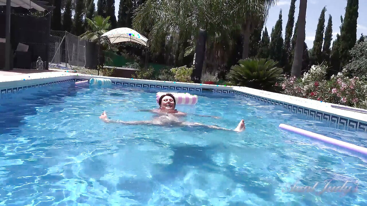 Busty Redhead MILF JoJo Robinson Goes Skinny Dipping in the Pool