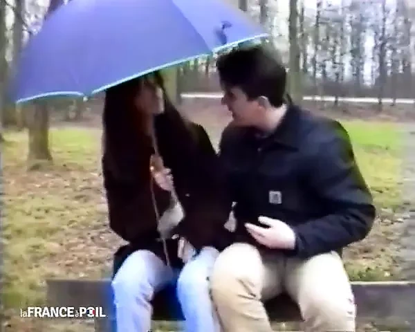 A Young Woman in Full Rupture Approached by Our Casteur in a Park.