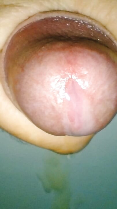 Close-up Mushroom head cock cumshot WITH handjob