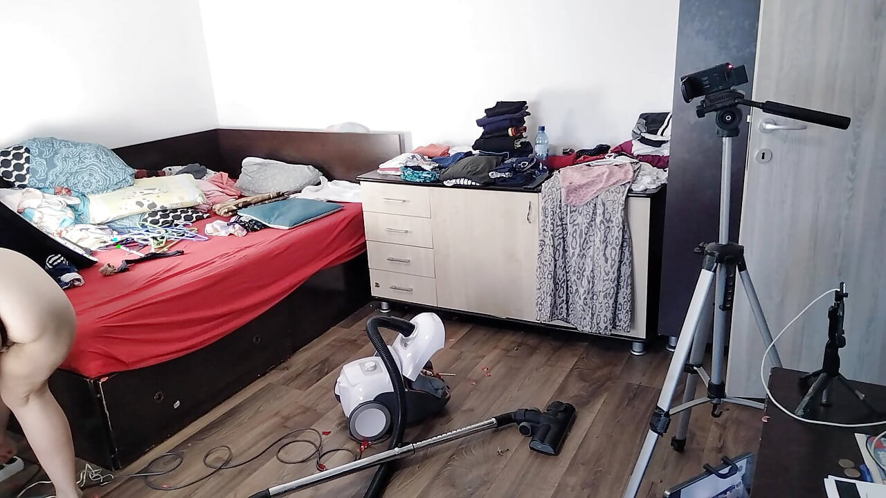Amateur Emma vacuuming the room. Amateur wife gives me a handjob until I cum