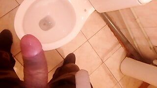 Fingering in the toilet, finished in the toilet.
