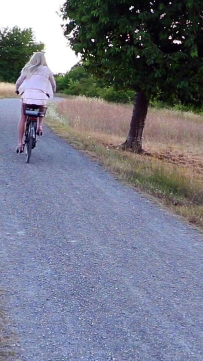 Jaw-dropping moment from "Posed & Wanked In Public - most exciting is biking in short clothes and shiny nylon stockings"