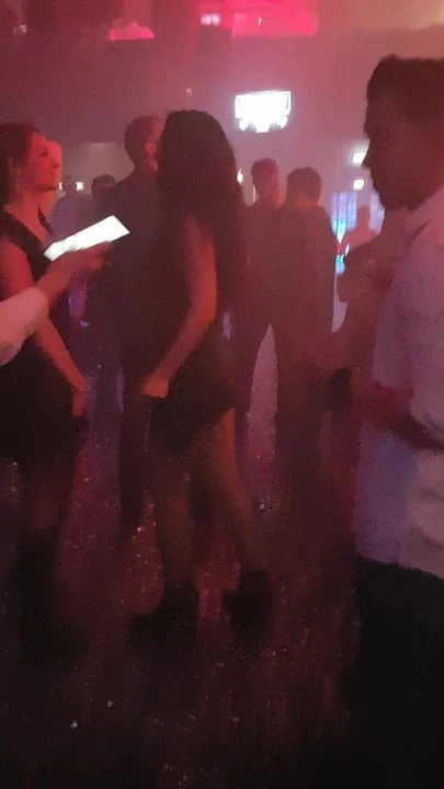 2 busty chicks dancing in front of me