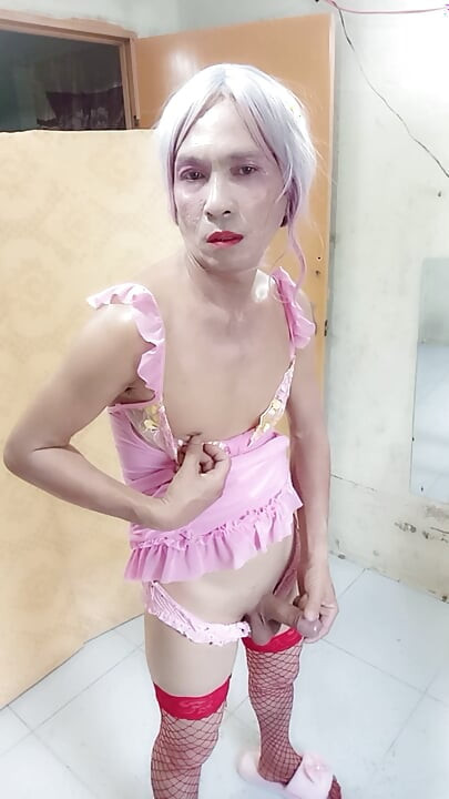 Oanh Le transgender wearing sexy and pornographic clothes standing and screaming is extremely happy