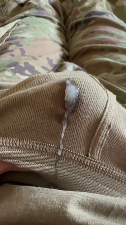 Horny soldier shoots creamy load through his military briefs and on his unit patch | Clip 1