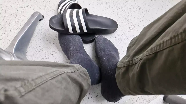 Addilettes with socks on the balcony 1