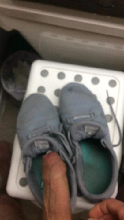 Cumshot on the sneakers of a girl in the gym