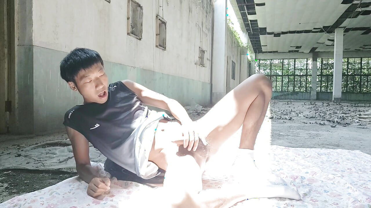 Cute Asian boy masturbates, moaning, ejaculating, and consuming fluids in a dreamlike light and shadow environment