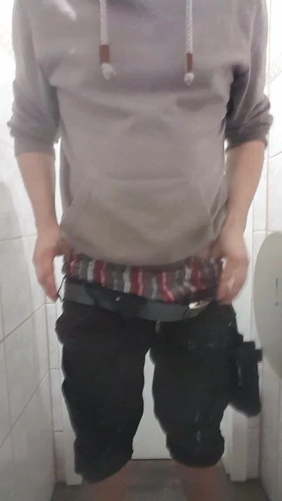 pissing in public bathroom