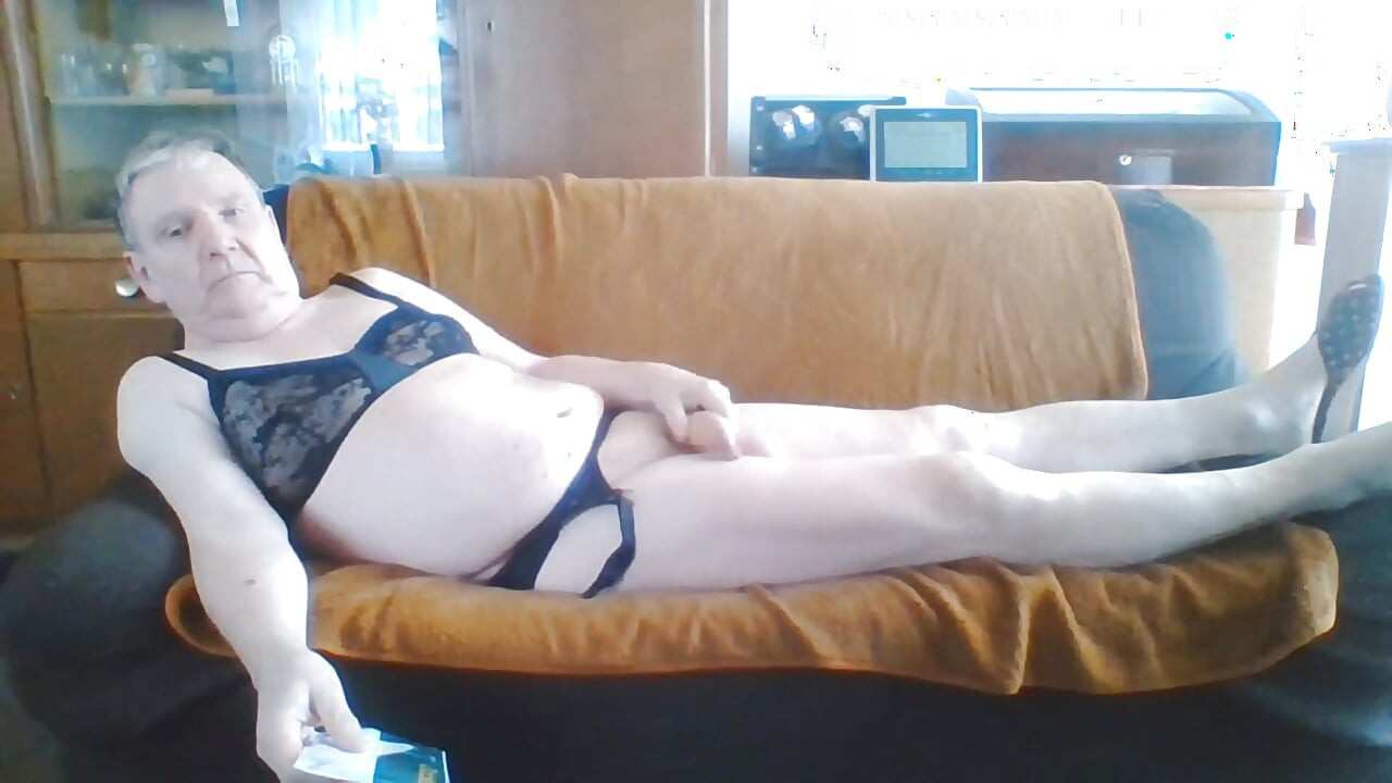 Andreas with suspender belt and bra jerking off