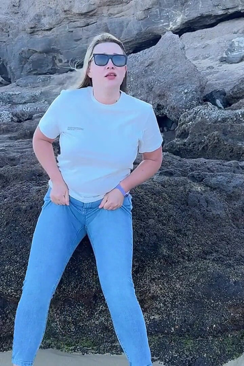 Peeing in Tight Jeans on the Beach