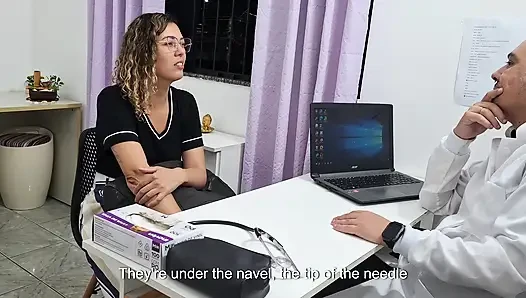 Medical examination of the patient's abdomen in the doctor's office.