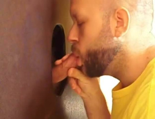 Hot sucking action at the homemade glory hole 8