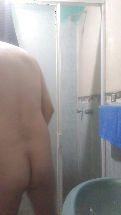 Man has fun before shower