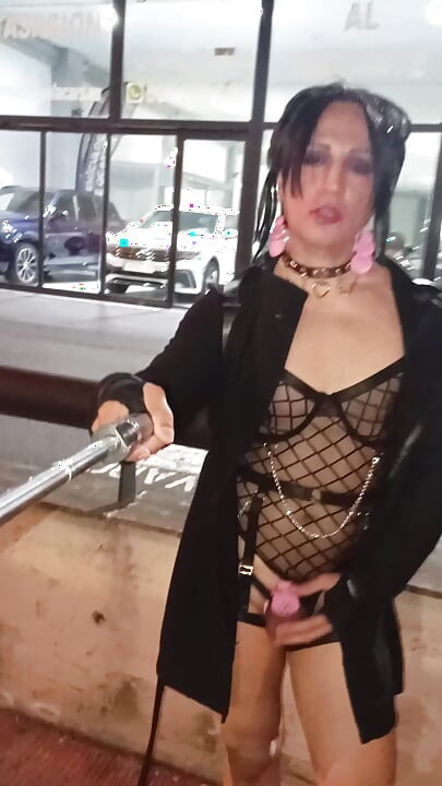 Taniax walks around the city in sexy black lingerie,showing her tiny cock in flat chastity cage