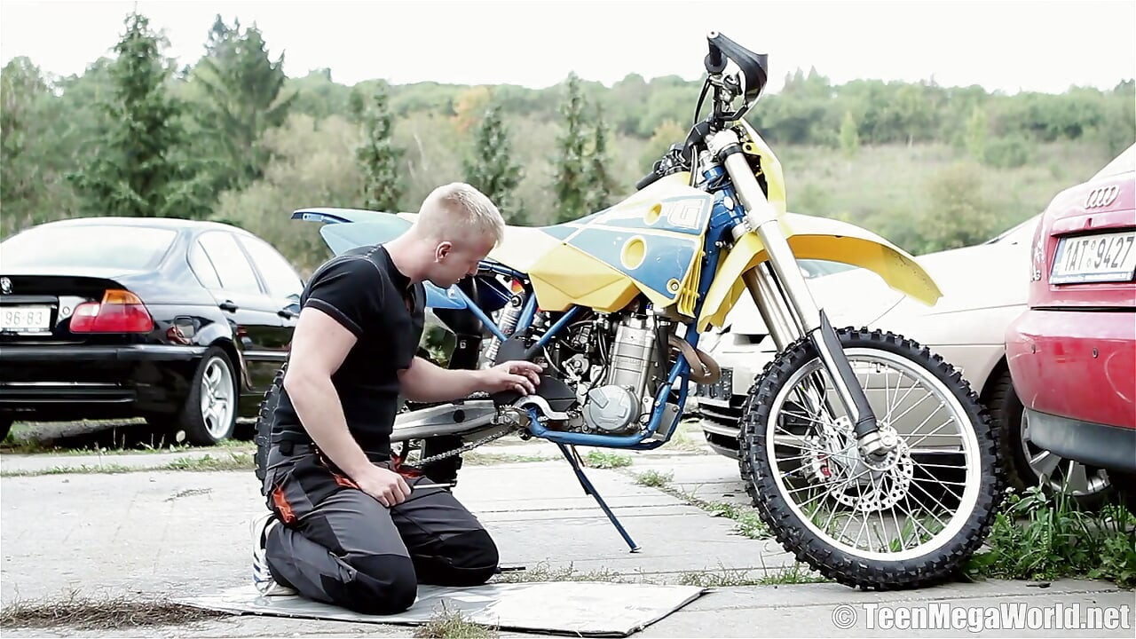 Licie fucks next to a bike