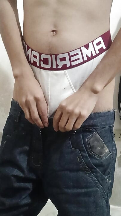 Skinny Latino plays in his room with his hairy cock