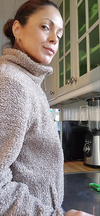 Angelina is cooking with carrots and she can't help treating them with her special spice.