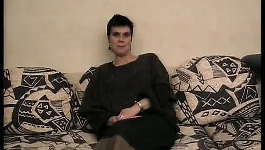 Slutty German whore gets sprayed with jizz during the interview