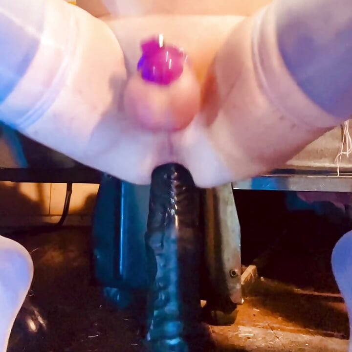 Compilation of me riding huge toys in chastity cages