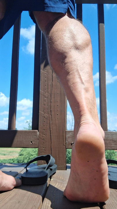My calf muscles and bare soles