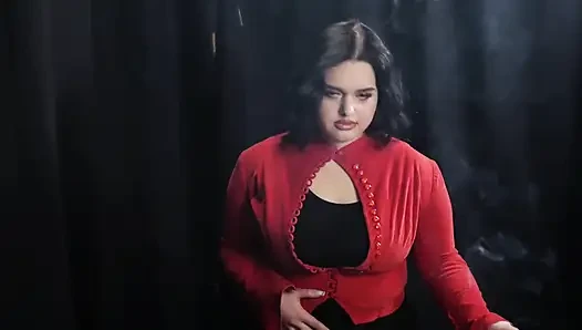 Curvy Brunette Smoking in Red Cardigan