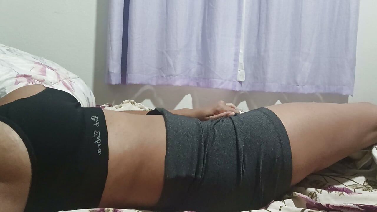 A girl enjoying a private and intimate moment in the comfort of her bed. A natural, homemade video full of sensuality