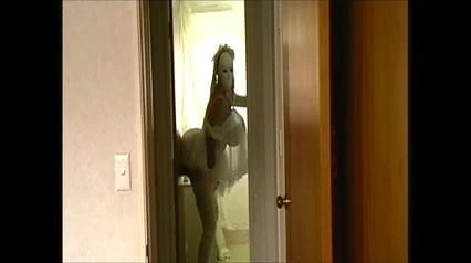 crossdresser playing with toy