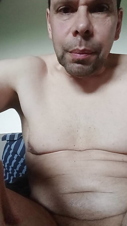 I aim for my face but the cum lands on my shoulder