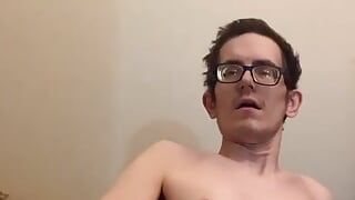 Boy plays with his diaper and dildo in bed