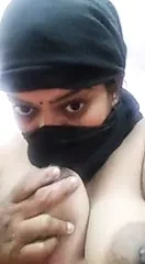 Tamil aunty stripping nude and fingering herself.