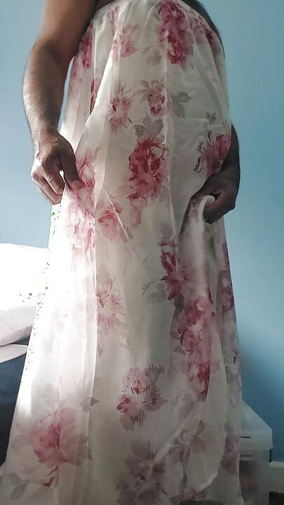 I'm masterbating in a flowery flowing silky seethrough fleard skirt and cum