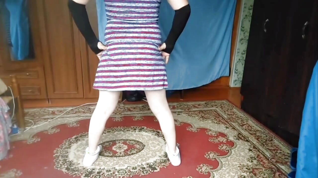 Sweet sissy showing off in adorable pink skirt