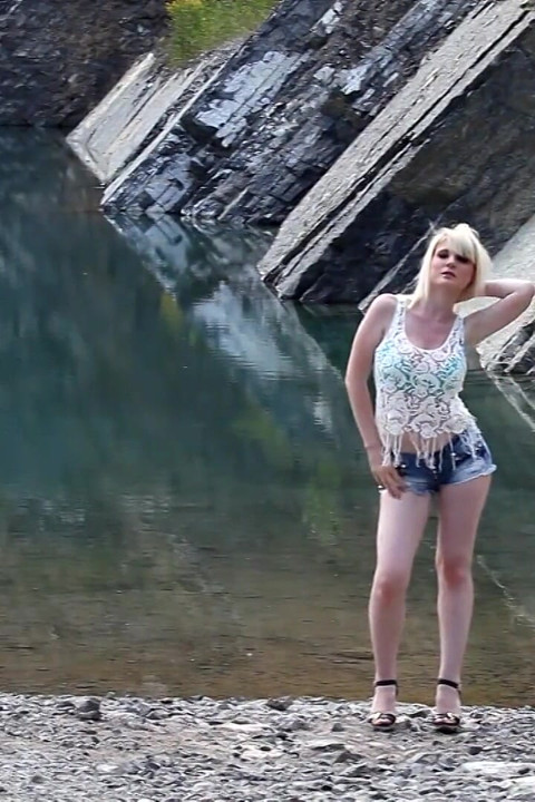 Outdoor shooting near lake with sexy MILF