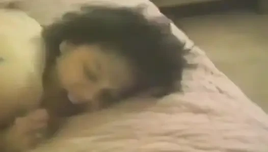 A brunette takes a big dick in doggy position