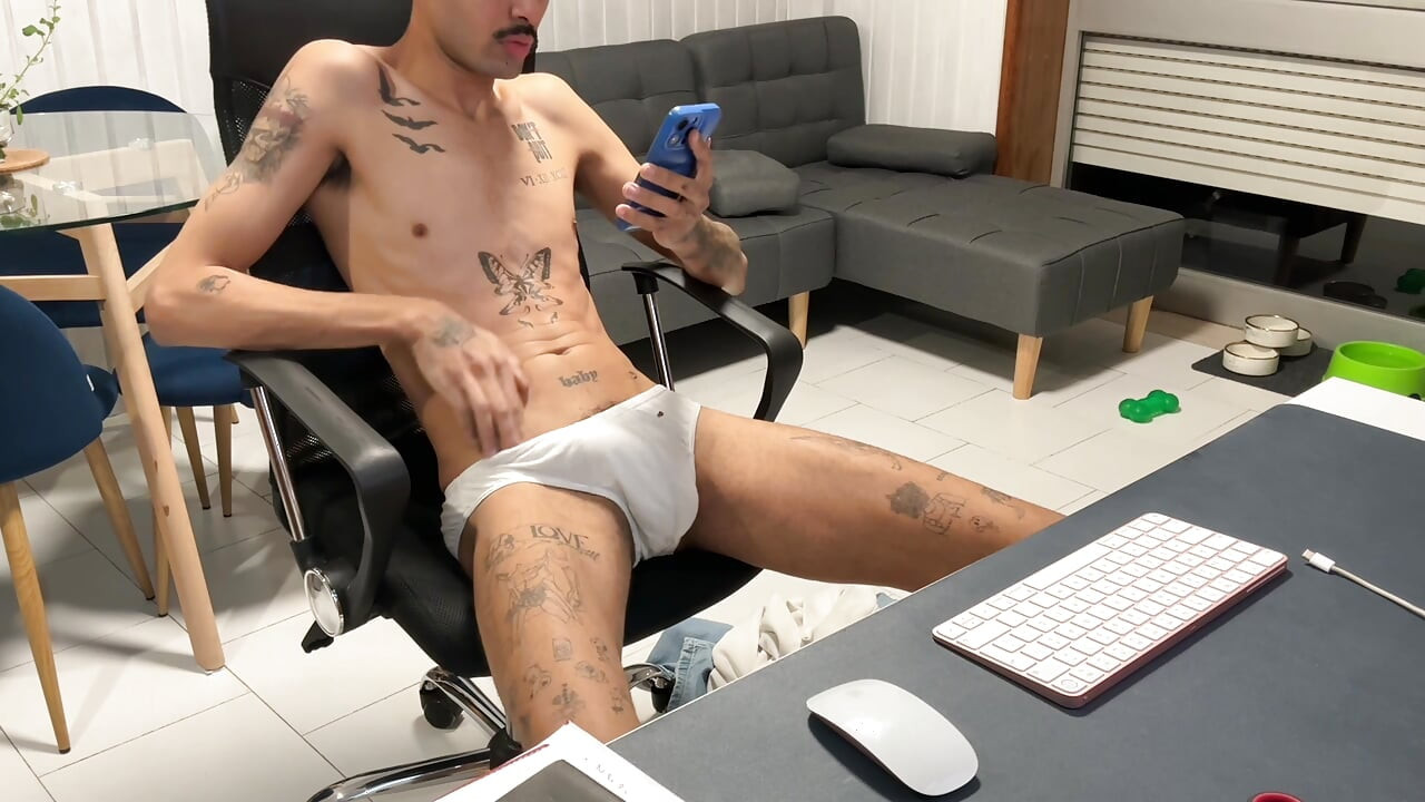Skinny guy in jeans, pulls his dick out and jerks off on webcam.