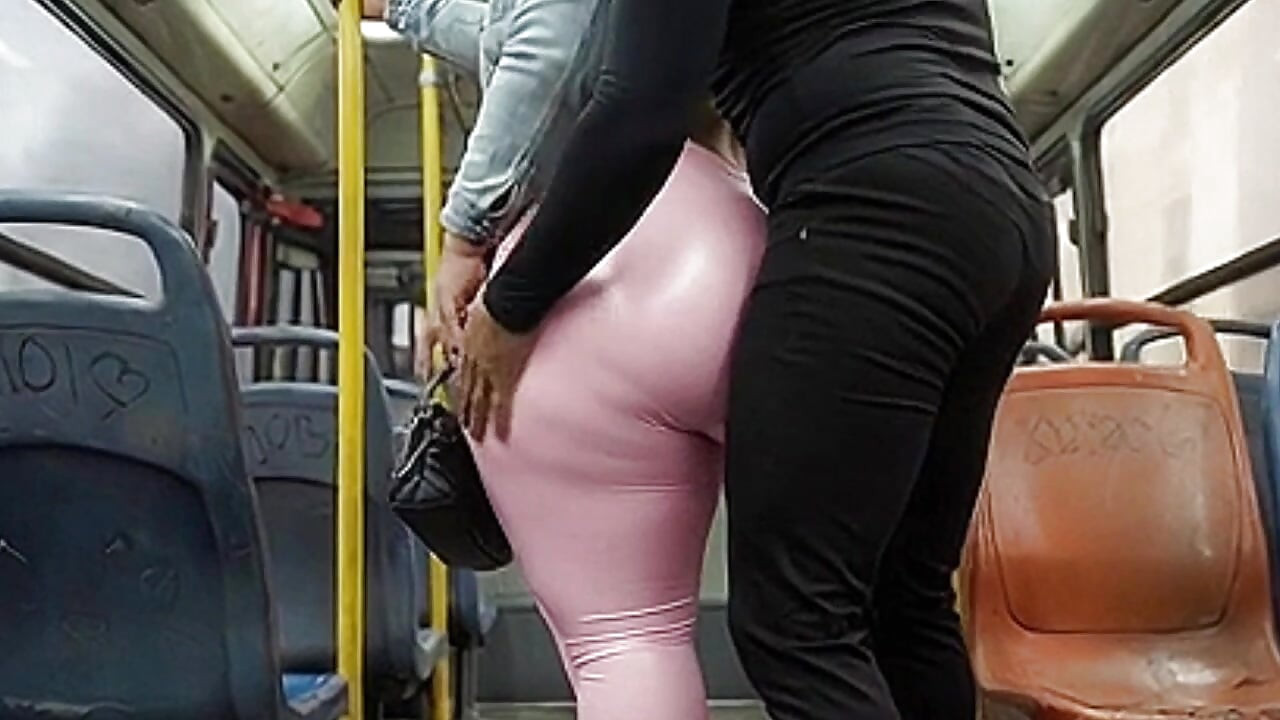 "Balaclava BBW Gets Ass  in Tight Shiny Pink Pants - Public Bus"