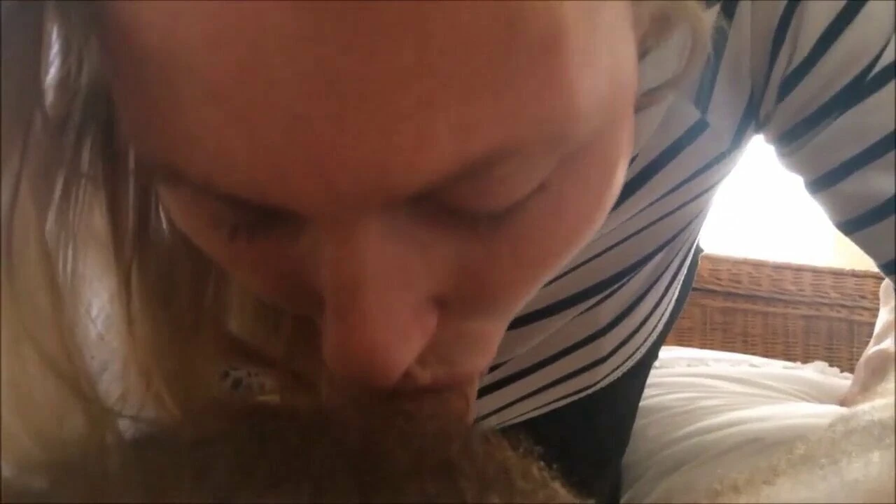 Sexy blonde deepthroats cock