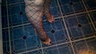 walking in fishnet and heels