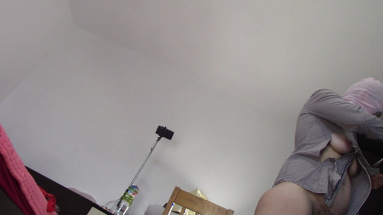 Sexy wife has fun testing clothes and cutting them. Brunette dances naked around the house.