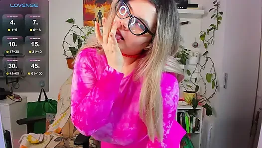 Cute chubby girl in pink dances sexy