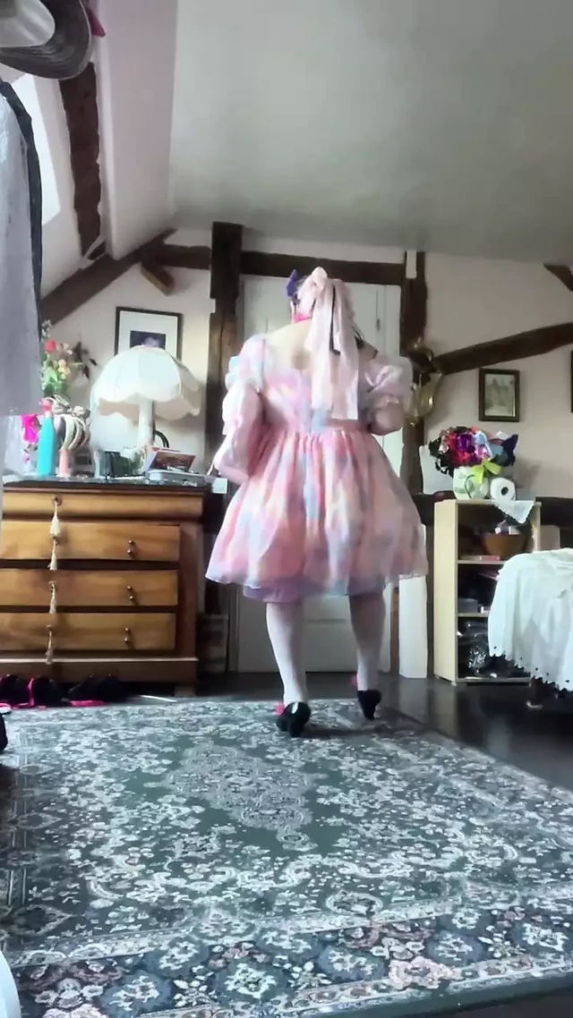 Dressed with a little multicolored dress for a day