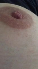 Playing with my nipple up close