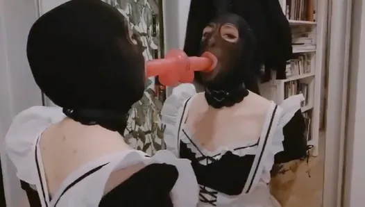 slave in maid dress trains throat for boss