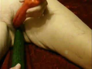 Mature slut sue using veg as sex toys