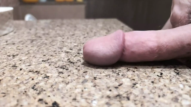 Slapping dick on the counter in slow motion