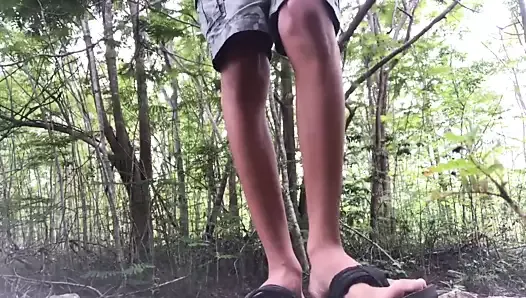 young boy jerks off and cum in the woods.
